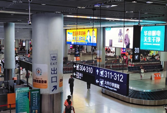 西安咸陽機場到達行李廳高空燈箱廣告投放，西安機場廣告價格