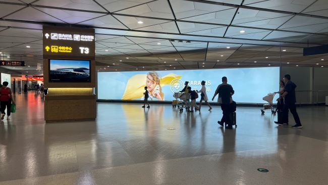 西安機(jī)場到達(dá)通廊正迎面落地?zé)粝鋸V告投放，西安咸陽機(jī)場廣告